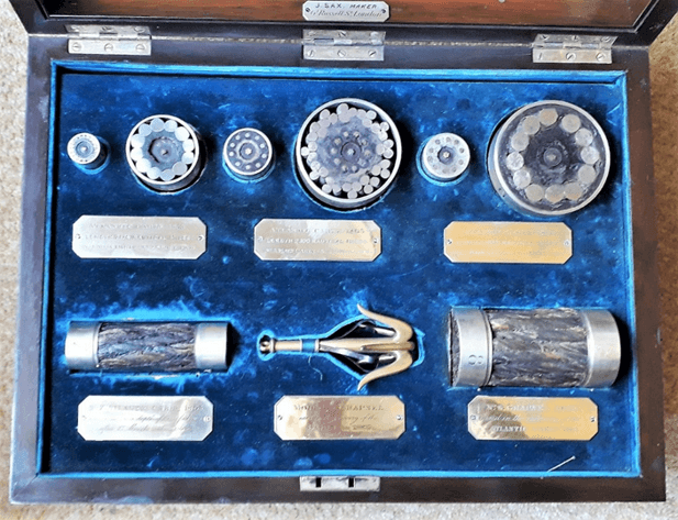 Webster and Horsfall presentation case, showing samples of the 1858, 1865 and 1866 cables, including a scaled-down replica of the grappling hook successfully used to retrieve the 1865 cable.